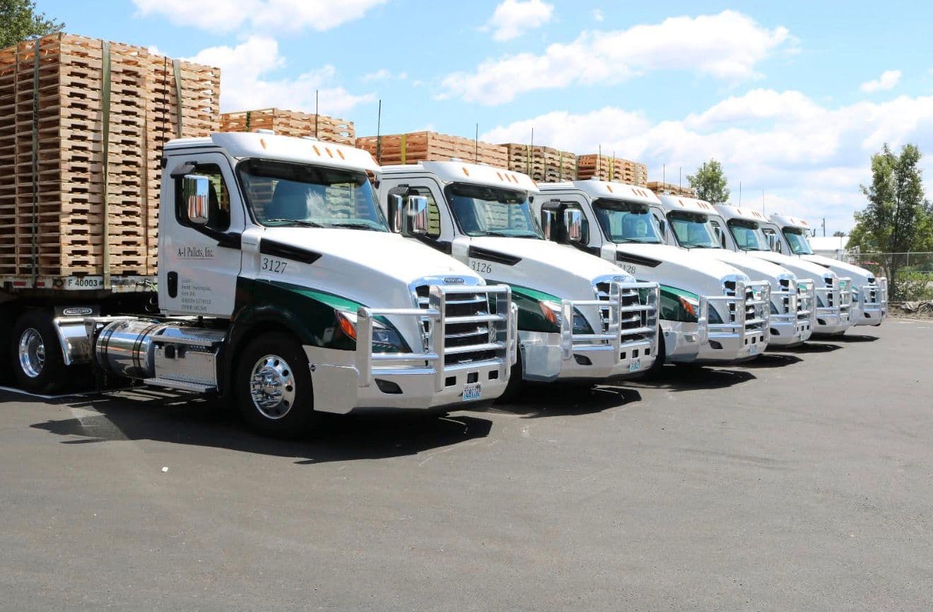 Fleet trucks loaded with pallets